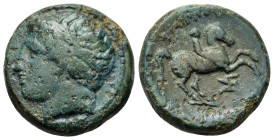Kings of Macedon, Philip II (359-336 BC). Æ (17.5mm, 6.20g). Uncertain Macedonian mint. Diademed head of Apollo l. R/ Horseman r.; monogram below. Cf....