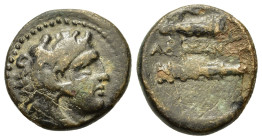 Kings of Macedon, Alexander III ‘the Great’ (336-323 BC). Æ (18,2mm, 5.2g). Uncertain mint in Macedon, 336-323. Head of Herakles r., wearing lion skin...