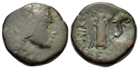 Thrace, Lysimacheia, c. 309-220 BC. Æ (17mm, 5.20g). Head of Herakles r., wearing lion skin. R/ Nike standing l., holding wreath and palm; c/m: dolphi...