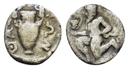 Islands off Thrace, Thasos, c. 404-340. AR Trihemiobol (11mm, 0.8g). Satyr kneeling l., holding kantharos and resting on hip. R/ Amphora; ΘAΣΙΩΝ aroun...