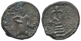 Arab Byzantine. Umayyad Caliphate. al-Malik ibn Marwan, AH 65-86 / 685-705 AD. Æ Fals (16mm, 3,3g), 'Standing Caliph' type. Caliph standing facing, be...