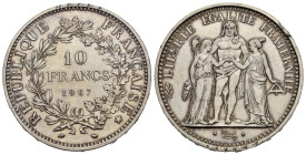 FRANCIA. 10 Francs 1967. Ag. Colpo al bordo. qFDC