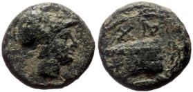 Kings of Macedon (Bronze, 2.19g, 10mm) Demetrios I Poliorketes (306-283 BC), Salamis. 
Obv: Helmeted head of Athena right 
Rev: BA, prow right; aphlas...
