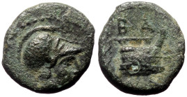 Kings of Macedon, Demetrios I Poliorketes, AE, (Bronze, 1.52 g 11mm), ca 306-283 BC. Salamis,
Obv: Helmeted head of Athena right.
Rev: BA, prow right;...