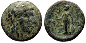 Aeolis, Temnos (2nd-1st centuries BC) AE (Bronze, 17mm, 3.34g) 
Obv: Wreathed head of Dionysos right 
Rev: Δ-H / T-A, Athena Nikephoros standing left,...