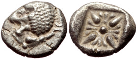 Ionia, Miletos AR Diobol (Silver, 9mm, 1.15g) Late 6th-early 5th century BC. 
Obv: Forepart of lion left, head reverted 
Rev: Stellate pattern within ...