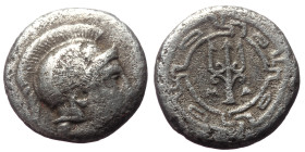 Ionia, Magnesia ad Maeandrum. AR Obol (Silver, 0.78 g 9mm) 350-190 BC. 
Obv: Helmeted head of Athena 
Rev: Trident within meander pattern, MA. 
Ref: S...