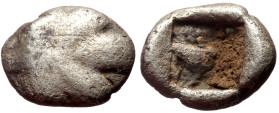 Islands off Karia, Rhodos, Kamiros AR Trihemiobol (Silver, 0.45g, 7mm) ca 500-460 BC. 
Obv: Fig leaf 
rev: Square incuse punch. 
Ref: Cf. SNG Copenhag...