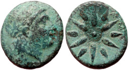 Mysia, Gambrion AE (Bronze, 3.49g, 17mm) 4th century BC
Obv: Laureate head of Apollo right.
Rev: Γ - Α - Μ, Star of twelve rays.
Ref: SNG France 908-2...