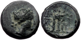 Mysia, Kyzikos, AE, (Bronze, 1.84g, 10mm), 3rd century BC. 
Obv: Head of Kore Soteira right.
Rev: KY ZI, Tripod; tunny below. 
Ref: SNG BN 431.