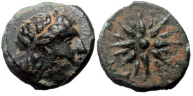 Mysia, Gambrion AE (Bronze, 0.86 g 9mm) 4th century BC. 
Obv: Laureate head of Apollo to right 
Rev: [Γ-Α-Μ] Star.
Ref:SNG BnF 908-921