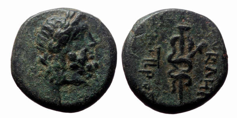 Mysia, Pergamon AE (Bronze, 3.83 g 15mm) ca 133-27 BC.
Obv: Laureate head of Ask...