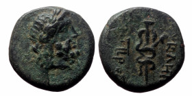 Mysia, Pergamon AE (Bronze, 3.83 g 15mm) ca 133-27 BC.
Obv: Laureate head of Asklepios right.
Rev: AΣKΛHΠIOY ΣΩTHPOΣ, serpent-entwined staff of Asklep...