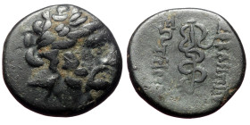 Mysia, Pergamon, AE (Bronze, 2.70 g 15mm) ca 133-27 BC.
Obv: Laureate head of Asklepios right.
Rev: AΣKΛHΠIOY ΣΩTHPOΣ, serpent-entwined staff of Askle...