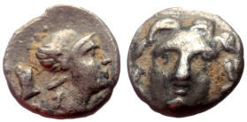 Pisidia, Selge AR Obol (Silver, 0.96g, 11mm) ca 4th century BC.
Obv: Head of gorgoneion facing with flowing hair 
Rev: Head of Athena right, wearing c...