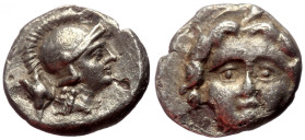 Pisidia, Selge AR Obol (Silver, 0.91g, 10mm) ca 4th century BC.
Obv: Head of gorgoneion facing with flowing hair 
Rev: Head of Athena right, wearing c...