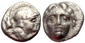 Pisidia, Selge AR Obol (Silver, 0.84g, 10mm) ca 4th century BC.
Obv: Head of gorgoneion facing with flowing hair 
Rev: Head of Athena right, wearing c...