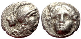 Pisidia, Selge AR Obol (Silver, 0.80g, 10mm) ca 4th century BC.
Obv: Head of gorgoneion facing with flowing hair 
Rev: Head of Athena right, wearing c...