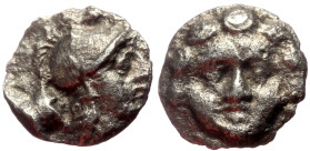 Pisidia, Selge AR Obol (Silver, 0.76g, 9mm) ca 4th century BC.
Obv: Head of gorgoneion facing with flowing hair 
Rev: Head of Athena right, wearing cr...