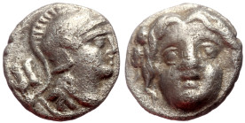 Pisidia, Selge AR Obol (Silver, 0.95g, 10mm) ca 4th century BC.
Obv: Head of gorgoneion facing with flowing hair 
Rev: Head of Athena right, wearing c...