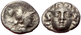 Pisidia, Selge AR Obol (Silver, 0.78g, 10mm) ca 4th century BC.
Obv: Head of gorgoneion facing with flowing hair 
Rev: Head of Athena right, wearing c...