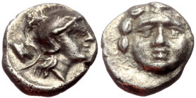 Pisidia, Selge AR Obol (Silver, 0.90g, 9mm) ca 4th century BC.
Obv: Head of gorgoneion facing with flowing hair 
Rev: Head of Athena right, wearing cr...