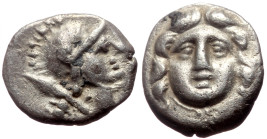 Pisidia, Selge AR Obol (Silver, 0.79g, 10mm) ca 4th century BC.
Obv: Head of gorgoneion facing with flowing hair 
Rev: Head of Athena right, wearing c...
