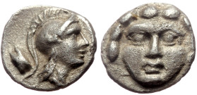 Pisidia, Selge AR Obol (Silver, 0.92g, 9mm) ca 4th century BC.
Obv: Head of gorgoneion facing with flowing hair 
Rev: Head of Athena right, wearing cr...