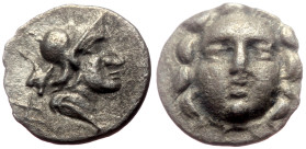 Pisidia, Selge AR Obol (Silver, 0.67g, 10mm) ca 4th century BC.
Obv: Head of gorgoneion facing with flowing hair 
Rev: Head of Athena right, wearing c...