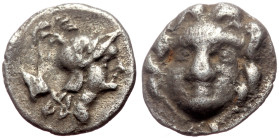 Pisidia, Selge AR Obol (Silver, 0.80g, 10mm) ca 4th century BC.
Obv: Head of gorgoneion facing with flowing hair 
Rev: Head of Athena right, wearing c...