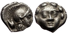 Pisidia, Selge (ca 350-300 BC) AR Obol (Silver, 0.84g, 9mm) Obv: Facing gorgoneion 
Rev: Head of Athena to right, wearing crested Attic helmet; astrag...