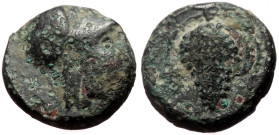 Cilicia, Soloi AE (Bronze, 1.70g, 11mm) 2nd-1st centuries BC 
Obv: Bust of Athena right
Rev: ΣΟΛΕΩΝ (?), Bunch of grapes on stalk; to right, Nike?;to ...