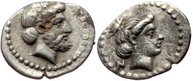 Cilicia, Nagidos AR (Silver, 0.59g, 12mm) ca 400-380 BC. 
Obv: Bearded head of Dionysos to right. 
Rev: Head of Aphrodite to right, her hair pulled up...