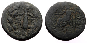 Cilicia, Tarsos (after 164 BC) AE (Bronze, 4.28g, 18mm) 
Obv: TARSEWN, Zeus seated left, holding Nike in right hand, sceptre in left; star and crescen...