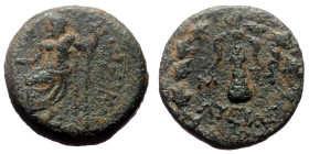 Cilicia, Tarsos (after 164 BC) AE (Bronze, 4.70g, 17mm) 
Obv: TARSEWN, Zeus seated left, holding Nike in right hand, sceptre in left; star and crescen...