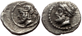 Cilicia Uncertain AR Hemiobol (Silver, 0.31g, 8mm) 4th century BC 
Obv: Diademed head of Zeus left. 
Rev: Helmeted and bearded male head (Ares?) left....