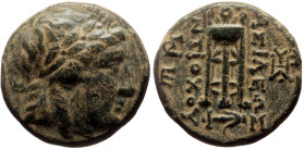 Seleukid Kings of Syria AE (Bronze, 3.91g, 16mm) Antiochos II (261-246 BC) Sardes 
Obv: Laureate head of Apollo right 
Rev: Tripod; anchor below; Σ an...
