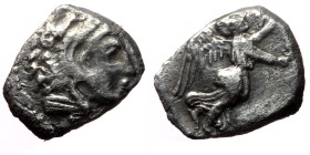 Seleukid King of Syria, Seleukos I Nikator, AR Obol (Silver, 0.58 g 8mm), 312-218 BC. Seleukeia on the Tigris I. 
Obv: Head of Herakles right, wearing...