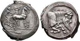 SICILY. Gela. Circa 465-450 BC. Tetradrachm (Silver, 28 mm, 17.77 g, 8 h). Charioteer, holding reins in his right hand and kentron in his left, drivin...