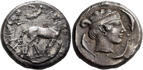 SICILY. Syracuse. Second Democracy, 466-405 BC. Tetradrachm (Silver, 23 mm, 17.32 g, 12 h), circa 450. Charioteer driving quadriga walking to right, h...