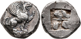 IONIA. Teos. Circa 500-475 BC. Stater (Silver, 20 mm, 11.83 g). Griffin, with curved wings, seated to right on ornamented ground line, raising left fo...