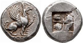 IONIA. Teos. Circa 500-475 BC. Stater (Silver, 20 mm, 11.79 g). Griffin, with curved wings, seated to right on ornamented ground line, raising left fo...