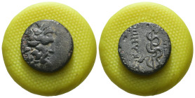 Mysia. Pergamon. (200-133 BC). Bronze Æ. Obv: helmeted head of Zeus right. Rev: Asklepios. Weight 3.37 gr - Diameter 16 mm