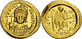 Justiniano I (527-565). Constantinopla. Sólido. (Ratto 460) (S. 140). Ligero doblez en borde del reverso. 4,46 g. MBC+.

Justinian I (527-565). Cons...