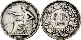 Suiza. 1874. B (Berna). 5 francos. (KM. 11). Golpecitos y rayitas. Escasa. AG. 24,77 g. MBC-.

Switzerland. 1874. B (Bern). 5 francs. (KM. 11). Ding...