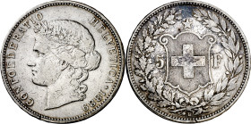Suiza. 1889. B (Berna). 5 francos. (KM. 34). Rayitas. Escasa. AG. 24,85 g. MBC-.

Switzerland. 1889. B (Bern). 5 francs. (KM. 34). Hairlines. Scarce...