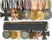 Orden & Ehrenzeichen: Erster Weltkrieg: Eine große Ordensspange mit 7 Stücken, dabei: Eisernes Kreuz II. Klasse 1914 (OEK 1909), Bayerisches MVK 3. Kl...