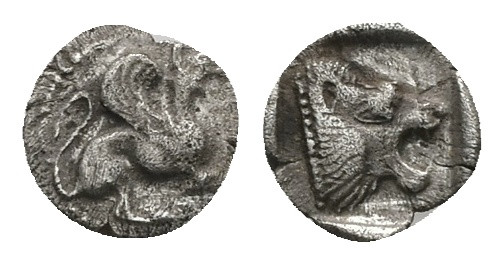 Troas, Assos. AR Obol. 0.50 g 8.73 mm. 5th century BC.
Obv: Griffin seated right...