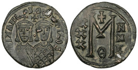 Michael II and Theophilus, AD 820-829. AE, Follis. 8.23 g. 29.86 mm. Constantinople.
Obv: [m]IXAHL-SΘ-EOFILOS. Michael, with crown and chlamys, short ...