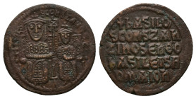 Basil I the Macedonian and Constantine VII, AD 867-886. AE, Follis. 8.60 g. 27.06 mm. Constantinople.
Obv: +bASILIO S COҺSTAҺ bASILIS. Basil I on lef...